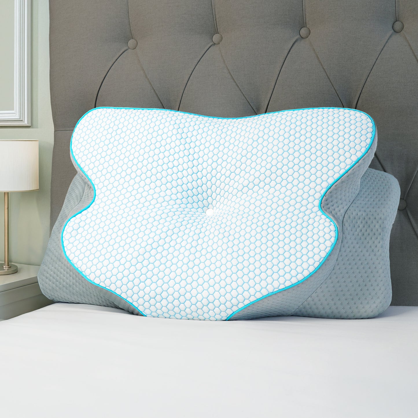 Atlas orthopaedic neck support pillow ergonomic butterfly design on a bed